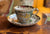 Masons Vista Leeds Polychrome Black Transferware Gold/Copper Lustre Teacup & Saucer