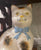 Single Black & Gold Sponge Spotted White Staffordshire Mantle Cat w/ Light Blue Bow