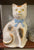 Single Black & Gold Sponge Spotted White Staffordshire Mantle Cat w/ Light Blue Bow