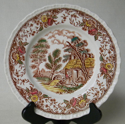 Brown Polychrome Transferware Plate Olde England Mother Holding Infant Children Playing Alongside a Stream